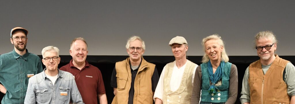 Unsere Vorführer posieren im Gruppenbild. Von links: Dorian Bracht, Guido Henn, Stefan Böning, Jan Hovens, Manne Krause, Melanie Kirchlechner, Hauke Schmidt. Nicht im Bild: Dominik Ricker, Matthias Wandel, Sandra Witteman.